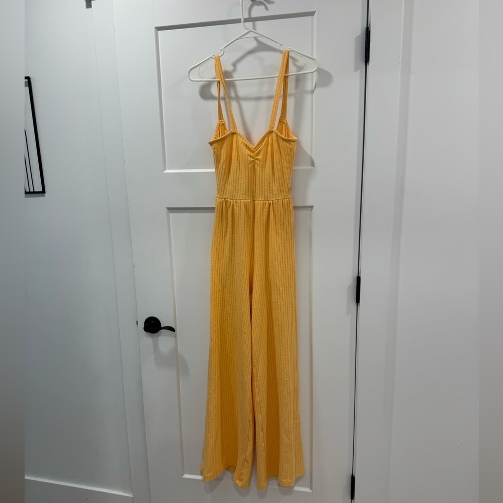 Roxy bright orange jump suit open back size small